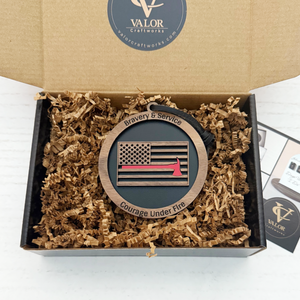 Decorative plaque with American flag design in a Valor Craftworks box.