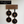 Wooden wall hanging with engraved locations and text on a white background