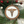 Decorative ornament with 'Healthcare Hero' and 'Care & Compassion' text on a wooden circle, surrounded by greenery and berries.
