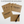 Kraft paper cards with 'Open When' text, customizable with a pen on a white background.
