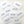 Set of white envelopes with black text on a light wooden surface
