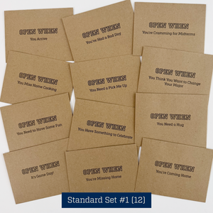 Set of brown cards with various 'Open When' phrases on a white background