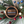 Wooden ornament with American flag design and text 'Honor & Duty', 'Protect & Serve' on a Christmas tree background.