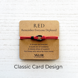 Red bracelet on a brown card with text on a white textured background