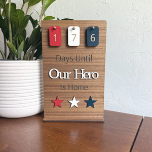 Personalized military homecoming countdown sign with walnut finish and red white and blue stars