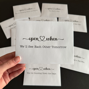 Full set of white Open When envelopes with pre-labeled encouragement prompts