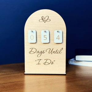 Maple wedding countdown display with white interchangeable number tiles and engraved details