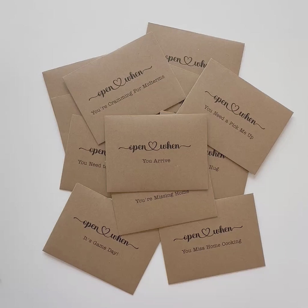 Video of Kraft open when cards - opening card, removing card to show front and back and then placing down on white background